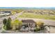 Unique dining experience with outdoor domes surrounding a charming building and well-maintained landscaping at 6133 S Sterne Cir, Littleton, CO 80120