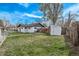 Large backyard with mature trees, shed, and plenty of green space at 6133 S Sterne Cir, Littleton, CO 80120