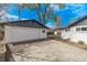 Spacious detached two-car garage with a concrete driveway and ample parking at 6133 S Sterne Cir, Littleton, CO 80120