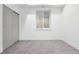 Basement area featuring carpet flooring, a window, and closet at 2190 Vine Ave, Boulder, CO 80304
