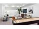 Finished basement featuring a shuffleboard table, seating area, and decorative plant at 2190 Vine Ave, Boulder, CO 80304