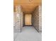 Close-up of the entrance, highlighting the modern wooden door, stone pillar, and contemporary design at 2190 Vine Ave, Boulder, CO 80304