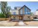 Stunning two-story home featuring stone accents, expansive windows, and a welcoming modern design at 2190 Vine Ave, Boulder, CO 80304