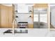Modern kitchen with white countertops, stainless steel appliances, and wood cabinetry at 2190 Vine Ave, Boulder, CO 80304