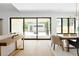 Living room with sliding glass doors providing views of the modern back patio at 2190 Vine Ave, Boulder, CO 80304