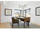 Bright home office with a desk, modern lighting, and large windows at 2190 Vine Ave, Boulder, CO 80304