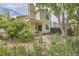 Backyard with a covered patio and a privacy fence at 2370 Redwood Ave, Lafayette, CO 80026
