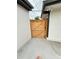 Wooden gate on the side of the home leads to the backyard and adds privacy at 1694 Xanthia St, Denver, CO 80220