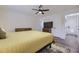 Bedroom featuring a ceiling fan and neutral decor at 1694 Xanthia St, Denver, CO 80220