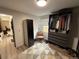Walk-in closet with closet system and LG Styler at 1694 Xanthia St, Denver, CO 80220