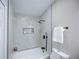 Bright bathroom features modern fixtures and marble-style tiled walls and a shower at 1075 S Garrison St # 201, Lakewood, CO 80226