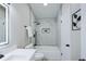 This bathroom features an illuminated mirror and shower and tub combo at 1075 S Garrison St # 201, Lakewood, CO 80226