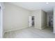 Bright bedroom featuring recessed lighting and access to a private bathroom at 1075 S Garrison St # 201, Lakewood, CO 80226