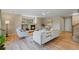 Bright living room with hardwood floors, fireplace, and natural light at 4626 Longs Ct, Broomfield, CO 80023