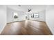 Spacious bedroom features hardwood floors, neutral walls, and a door to the outdoor living space at 5031 Moss Pl, Golden, CO 80403