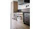 Close-up of the stainless steel oven and custom cabinetry at 5031 Moss Pl, Golden, CO 80403