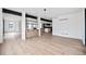 Open living space features hardwood floors, wet bar and plenty of natural light at 5031 Moss Pl, Golden, CO 80403