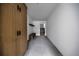 Bright mudroom features tile flooring, custom wood cabinets, and a built-in bench for added convenience at 5031 Moss Pl, Golden, CO 80403