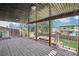 Covered back patio with brick floor and open view of the backyard at 11035 W Grand Pl, Littleton, CO 80127