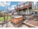 Backyard with hot tub, wood fence and manicured yard at 11035 W Grand Pl, Littleton, CO 80127