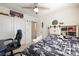 Bedroom with a gaming setup and ceiling fan at 1171 E Hopkins Dr, Elizabeth, CO 80107