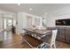 Dining area with wood table and bench seating at 1171 E Hopkins Dr, Elizabeth, CO 80107