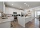 Modern kitchen with stainless steel appliances and an island at 1171 E Hopkins Dr, Elizabeth, CO 80107