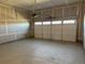 View of the spacious garage, ready for your vehicles and storage needs at 8945 Rifle St, Commerce City, CO 80022