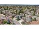 Aerial view of a suburban home with mature trees on an attractive street in a neighborhood at 5459 E Dry Creek Cir, Centennial, CO 80122