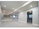 Finished basement with open layout and wet bar at 3050 S Ash St, Denver, CO 80222