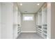 Large walk-in closet with ample shelving and drawers at 3050 S Ash St, Denver, CO 80222