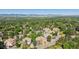 Bird's eye view of homes surrounded by mature trees in the neighborhood at 2587 S Harlan Ct, Lakewood, CO 80227