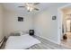 Cozy bedroom features wood-look floors and an adjacent hallway creating a comfortable and private retreat at 3144 S Wheeling Way # 401, Aurora, CO 80014