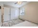 Bright bedroom with light floors, a large closet, and a window for natural light at 3144 S Wheeling Way # 401, Aurora, CO 80014