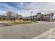 Well-maintained building with large windows, attractive landscaping, and accessible parking at 3144 S Wheeling Way # 401, Aurora, CO 80014