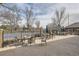 Outdoor patio with tables and chairs, offering a comfortable space for socializing and enjoying the community amenities at 3144 S Wheeling Way # 401, Aurora, CO 80014
