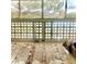 Light-filled sunroom offering a peaceful retreat with glass block windows and views of the outdoors at 3144 S Wheeling Way # 401, Aurora, CO 80014