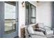 Cozy balcony with comfortable seating, offering a relaxing outdoor space with scenic views at 3550 Uinta St # 6, Denver, CO 80238