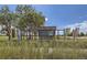 Signage for the Aurora Sports Park features landscaping in front and a blue sky and trees in the background at 2190 S Haleyville Way, Aurora, CO 80018