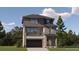A modern two-story home featuring stone accents, a covered porch and a two car garage in a desirable neighborhood at 2190 S Haleyville Way, Aurora, CO 80018