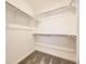 Spacious walk-in closet featuring ample shelving and rod space for storage at 2190 S Haleyville Way, Aurora, CO 80018