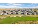 Spacious community with beautiful homes, a golf course, and manicured lawns at 8075 S Vandriver Way, Aurora, CO 80016