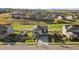 Beautiful two-story home with a manicured lawn and professional landscaping at 8075 S Vandriver Way, Aurora, CO 80016