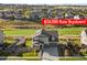 Beautiful two-story home with a manicured lawn and a $20,000 Rate Buydown offer at 8075 S Vandriver Way, Aurora, CO 80016