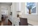 Charming office nook with built-in desk, granite counters, and a bright window offering a pleasant workspace at 8075 S Vandriver Way, Aurora, CO 80016