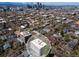 Aerial view of condo building and neighborhood with mature trees; great walkable location near city center at 1090 N Lafayette St # 305, Denver, CO 80218
