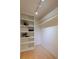 Walk-in closet with built-in shelving and ample storage space at 1090 N Lafayette St # 305, Denver, CO 80218
