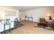 Well-lit living area featuring hardwood floors and modern decor, perfect for relaxation at 1090 N Lafayette St # 305, Denver, CO 80218