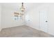 Bright bedroom with carpet, neutral walls, and a large closet at 3428 S Sherman St, Englewood, CO 80113