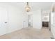 Spacious bedroom with a chandelier and ensuite at 3428 S Sherman St, Englewood, CO 80113